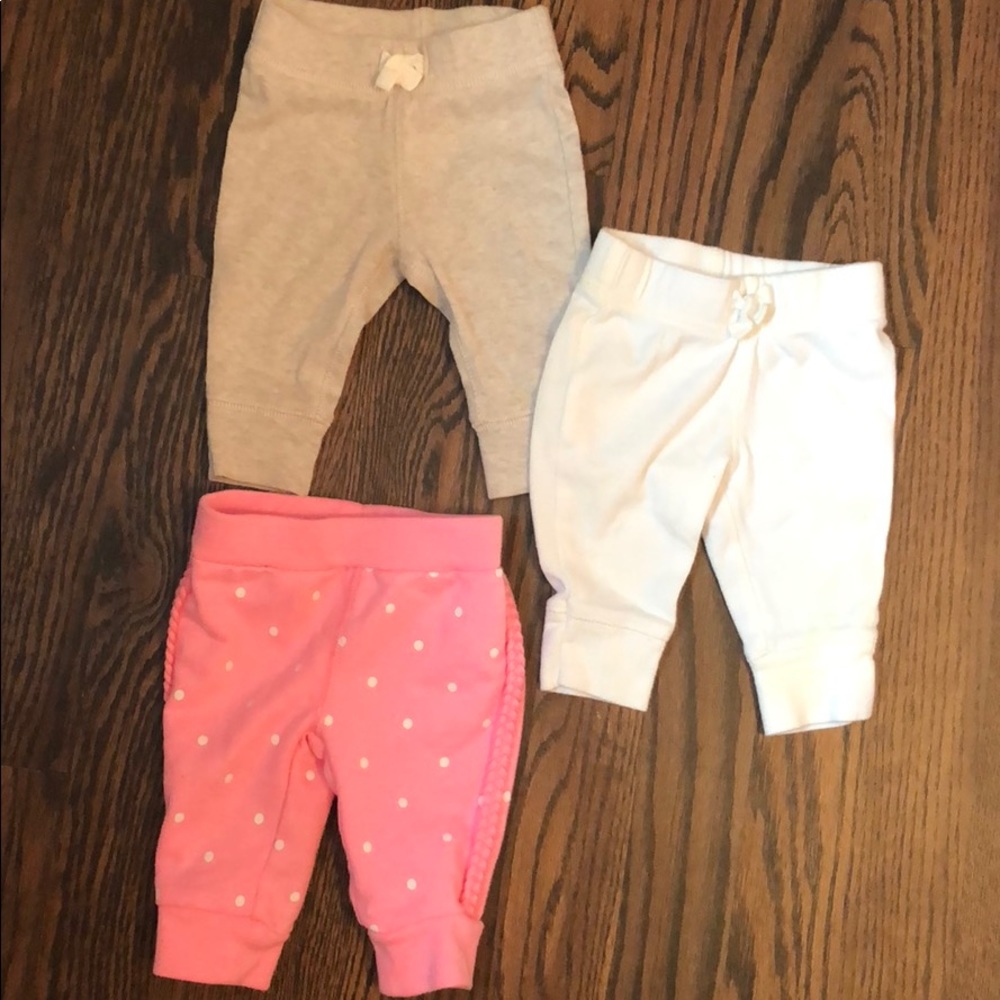 3 pairs Carters NB pants: ivory, khaki, and pink